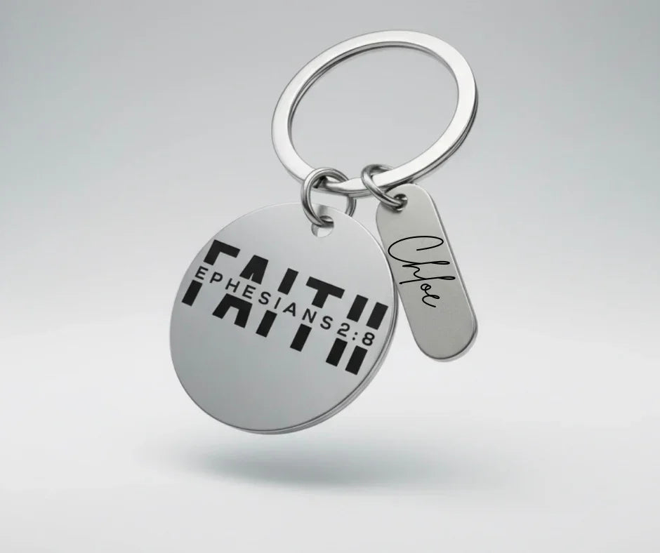 Silver keychain with round tag inscribed FAITH EPHESIANS 2:8 and small tag engraved with Chloe